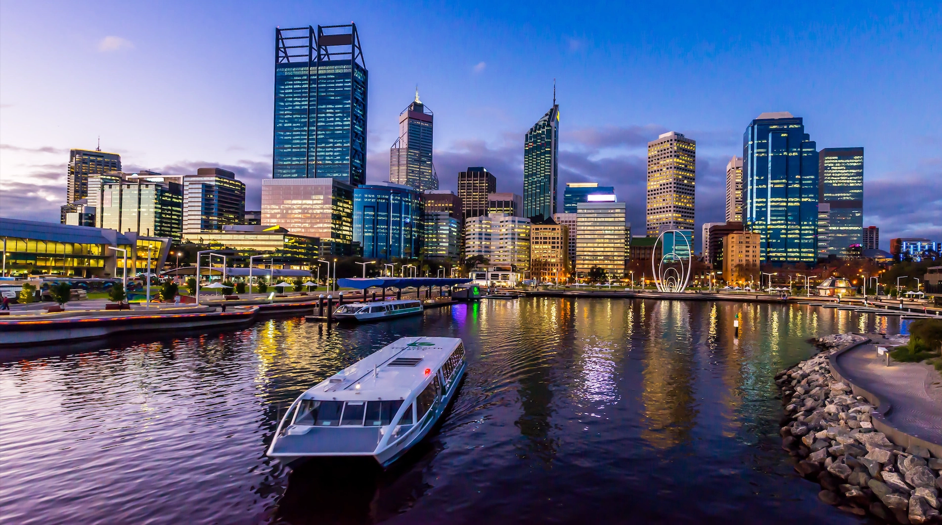 Perth skyline at dusk, representing integrated property services delivered across commercial buildings in Western Australia.