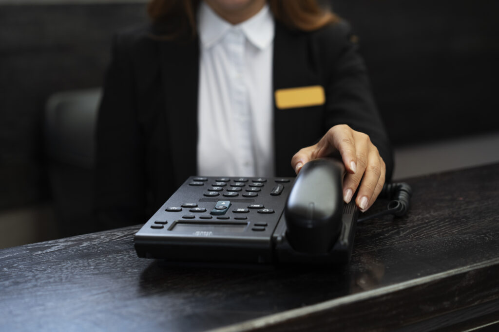 Concierge pop‑up desk in the lobby encouraging employees to submit quick requests.