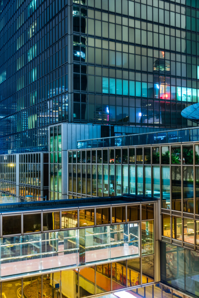 Premium CBD office tower lobby with professional facilities management staff and modern building systems