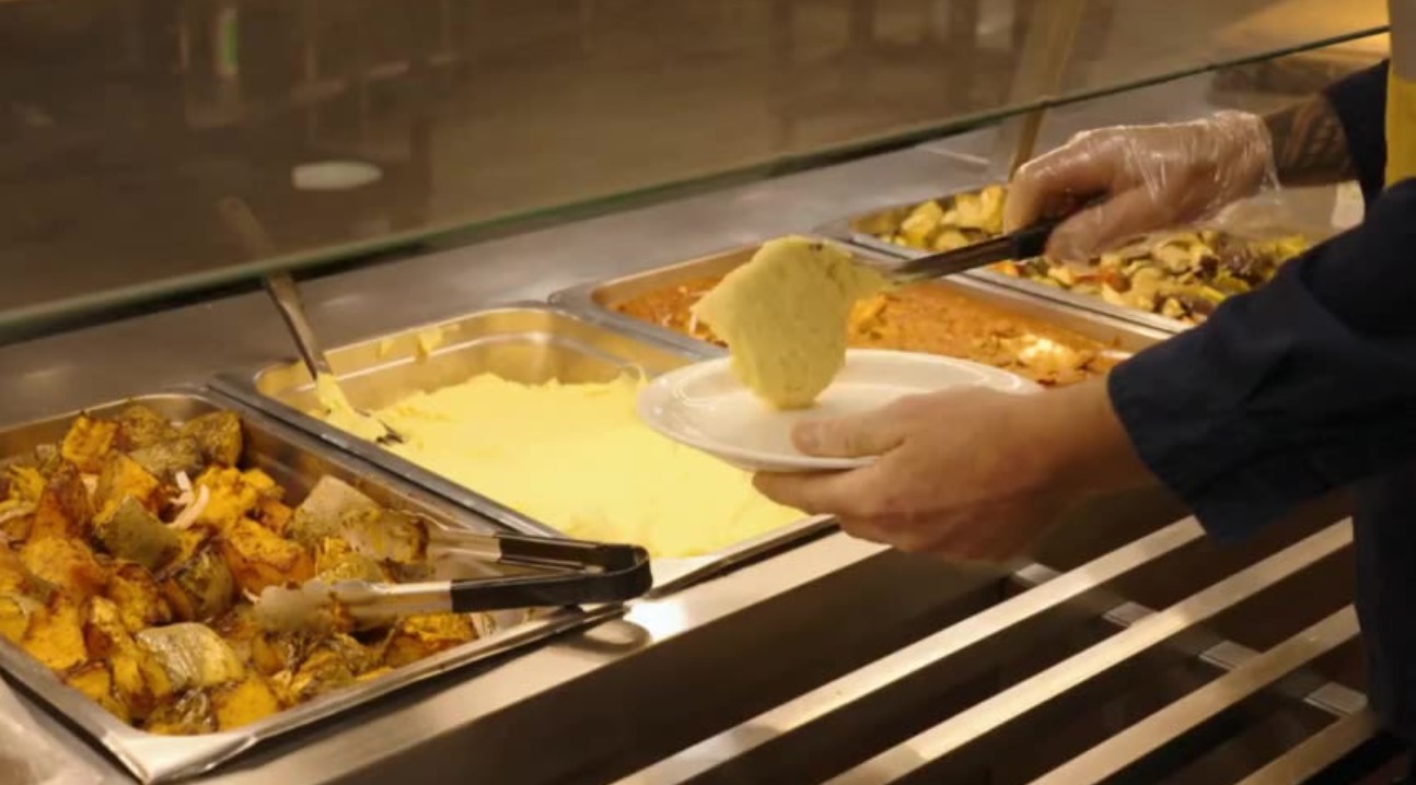 Cameron Facilities chef preparing corporate catering meals in a Perth kitchen