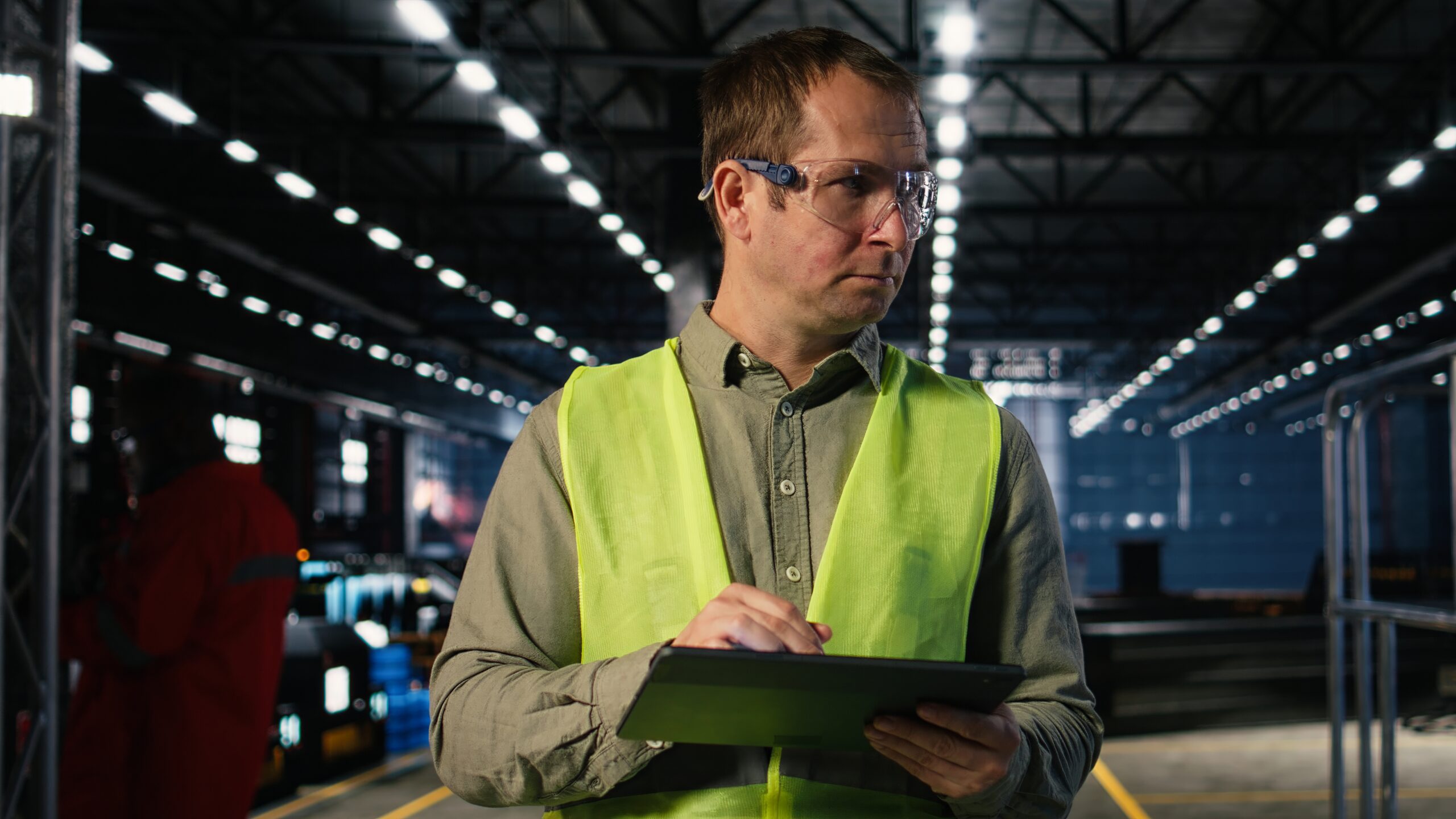 Cameron Facilities site manager reviewing safety compliance documentation at a remote WA mining camp