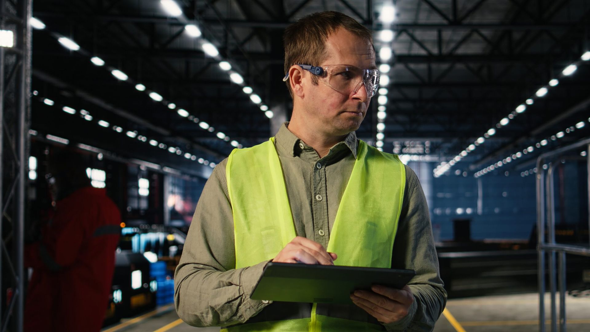 Cameron Facilities site manager reviewing safety compliance documentation at a remote WA mining camp